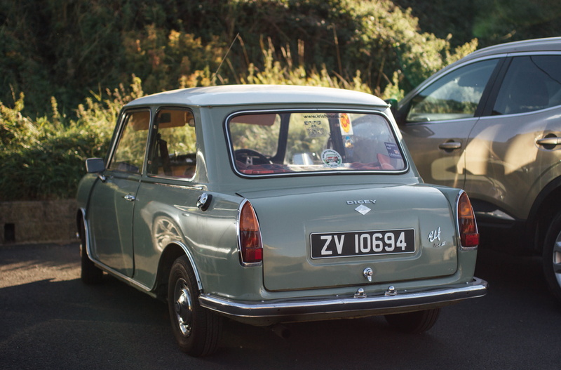 mode of transportation, grey, nature, retro styled, plant, license, retro car, day, glass - material, focus on foreground, vehicle, mini, outdoors, caravan
