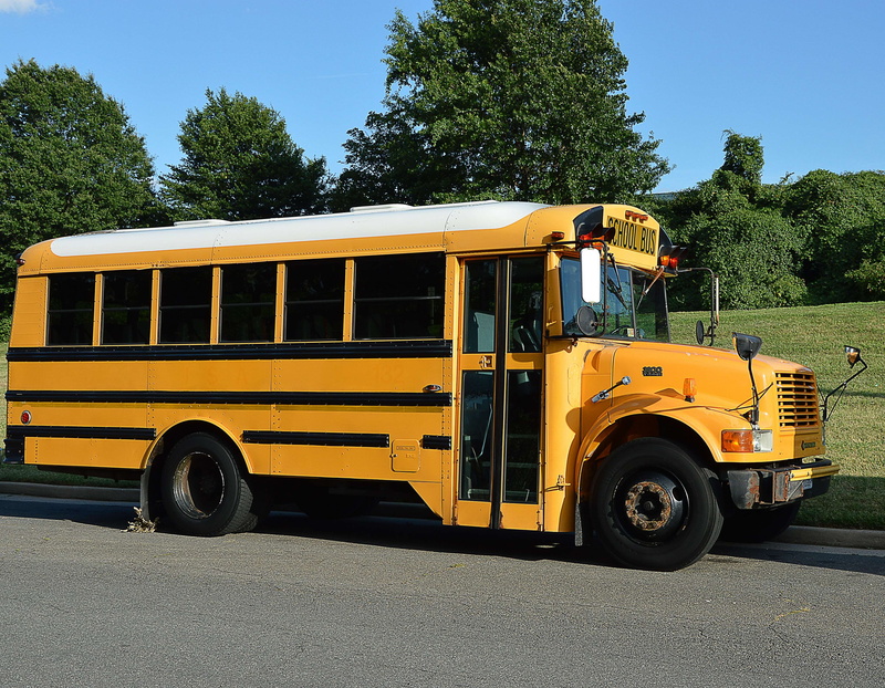 america, shadow, transportation, street, motor vehicle, outdoors, tree, wheel, day, no people, stationary, 4K, sunlight, public transportation, bus, plant