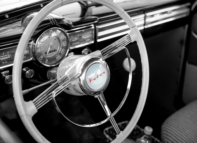 tower, mode of transportation, Volvo, symbol, no people, motor vehicle, maroon, vehicle interior, car interior, number, Volvo pv444, control panel, speedometer