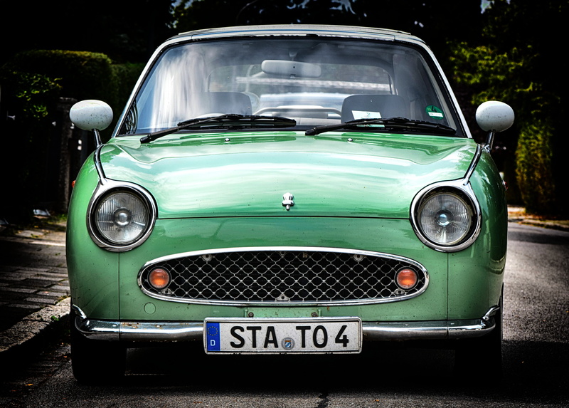 retro styled, outdoors, text, car, auto, headlight, communication, japanese, figaro, no people, stationary, right hand drive, 5K, city, japan, nissan