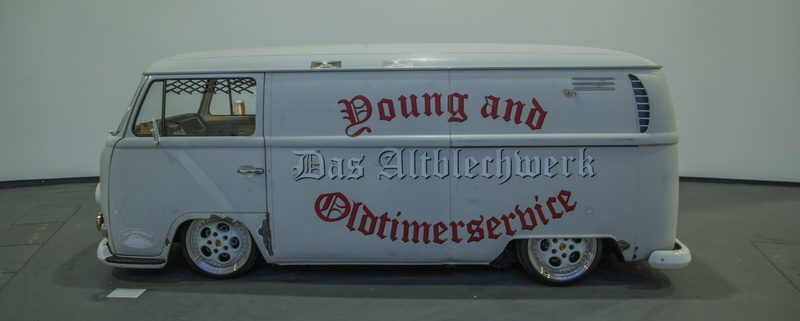 cargo, vehicle, architecture, indoors, oldtimer, automotive, communication, car, capital letter, mode of transportation, volkswagen, white color, wheel
