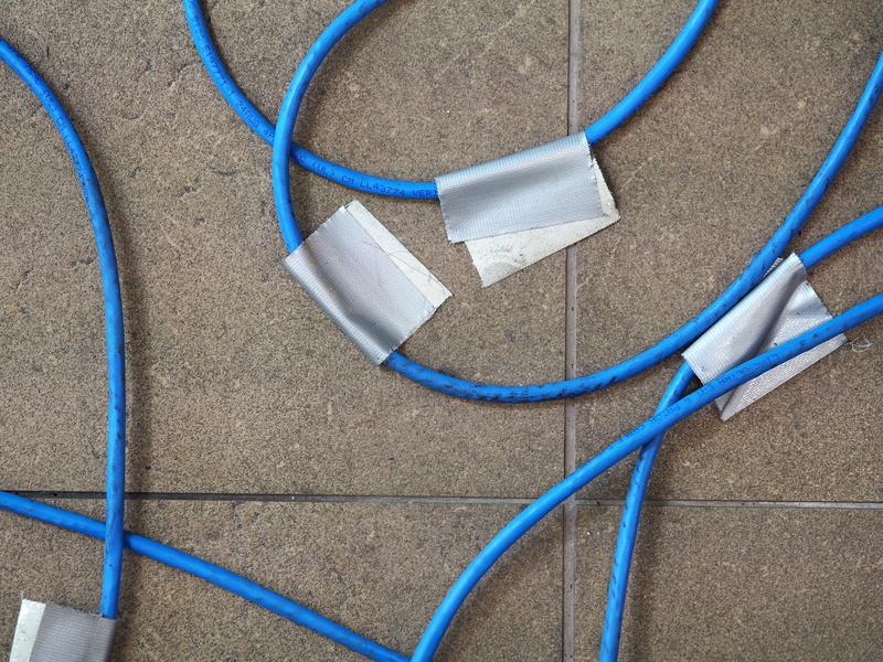 computer cable, no people, flooring, high angle view, ground, network connection plug, electricity, Computer, gardening equipment, multi colored, garden hose