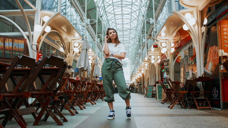 furniture, flooring, indoors, apparel, young women, clothing, person, full length, casual clothing, human, pants, young adult, one person, day, 5K, built structure