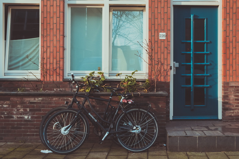 black, brown, window, glass, street, wheel, achitecture, architecture, decor, building, bikes, entrance, outdoors, step, no people, bicycle, stationary
