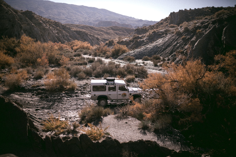 parked, mountain range, leaf, suv, outdoors, scenics - nature, mode of transportation, land vehicle, bush, transportation, car, landrover, land, near, environment