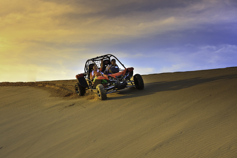 men, action, sand dune, climate, sand, buggy, transportation system, land, environment, sky, race, cloud - sky, road, car, transportation, one person, outdoors