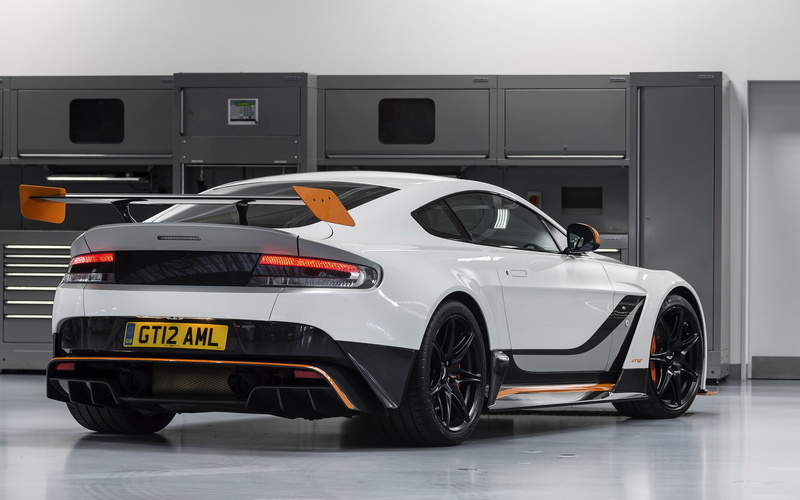 Aston Martin V12 Vantage, car, showroom, retail, sports car, design, indoors, no people, land vehicle, modern, wealth, in a row, luxury, Aston Martin GT12 Vantage