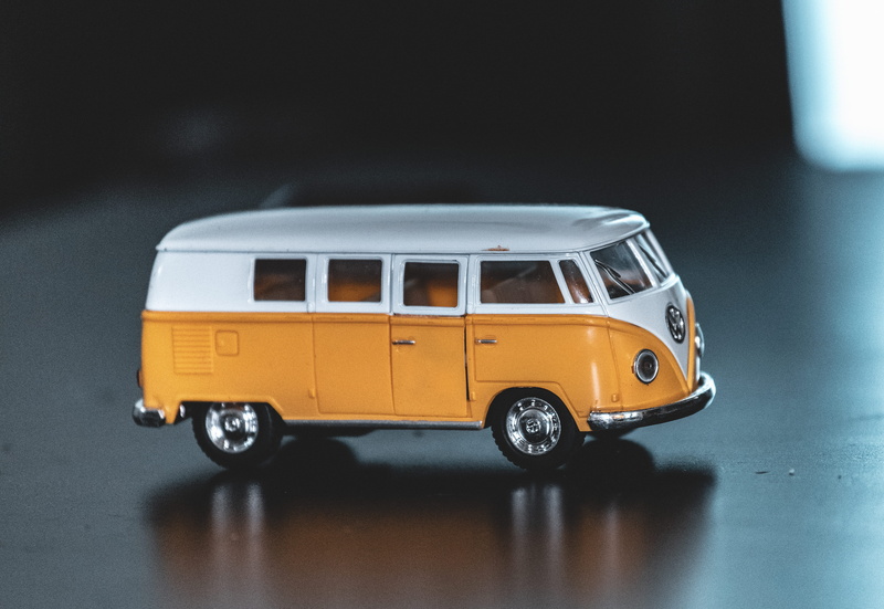 land vehicle, apparel, tire, transportation, 5K, close-up, yellow, model, mode of transportation, automobile, car wheel, toy, toy car, bus, rv, white