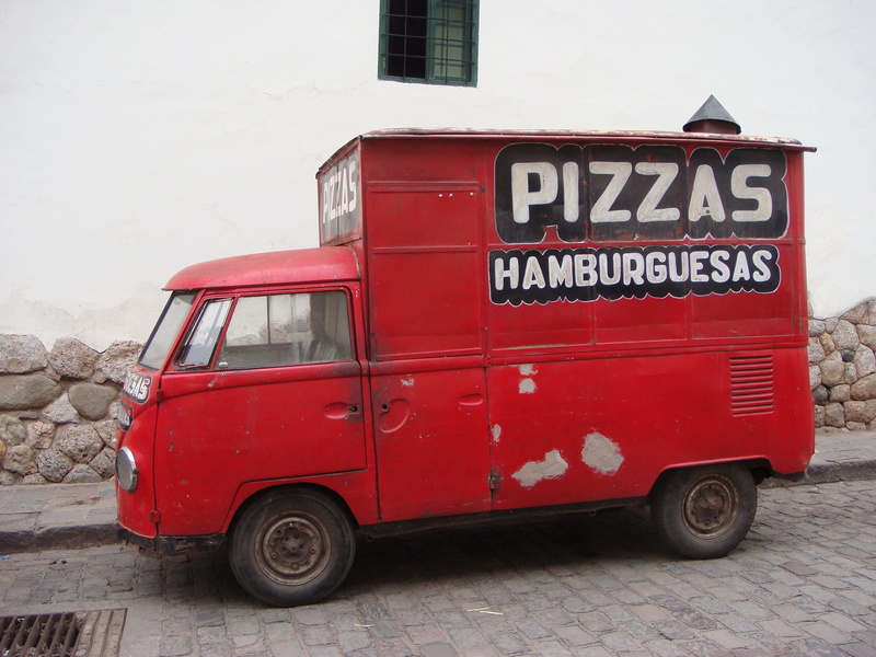 2K, built structure, land vehicle, minibus, building exterior, stationary, pizza delivery boy, service, communication, wall - building feature, red, street
