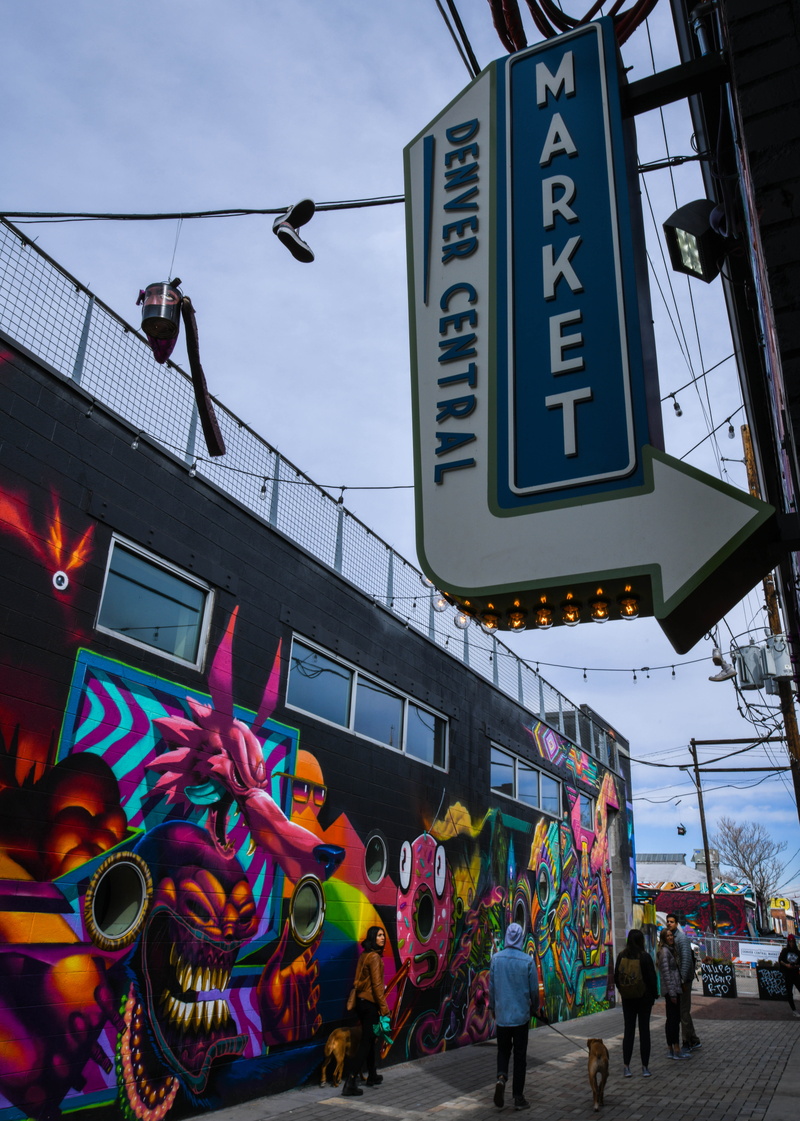 art, transportation, wall, road, men, van, asphalt, person, built structure, train, representation, building exterior, low angle view, mural, moving van