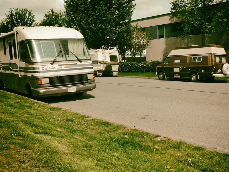 housing, motor vehicle, green color, rv, nature, van, coupe, wheel, bus, tree, abies, land vehicle, trucking, fir, machine, outdoors, day, grass, commercial land vehicle