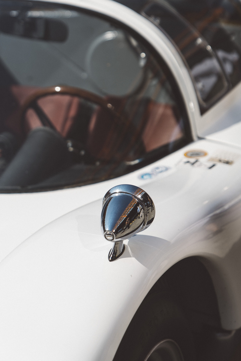 metal, vehicle, car, accessory, windshield, side-view mirror, white, car wheel, vintage car, day, alloy wheel, accessories, focus on foreground, cars, personal accessory