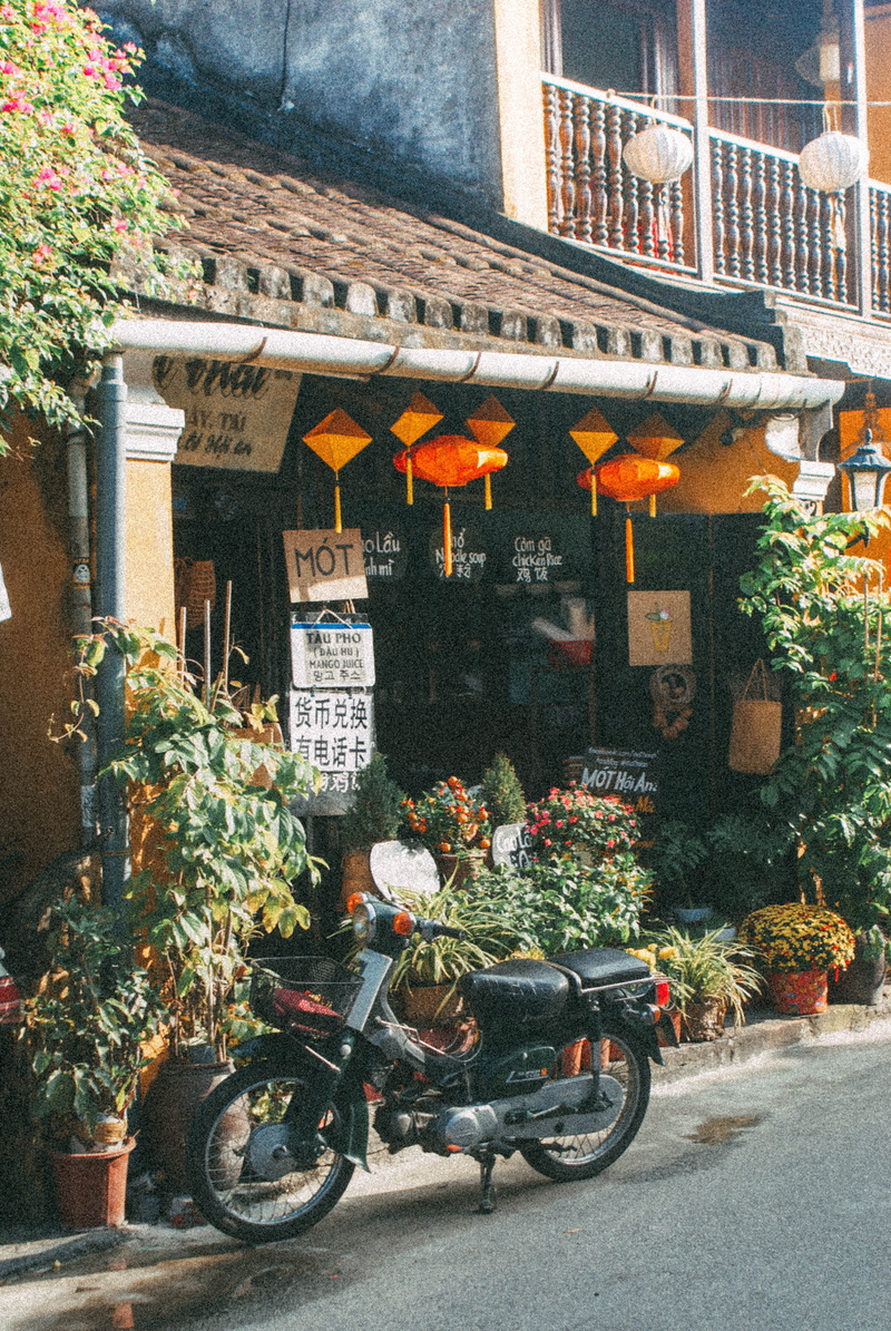 transportation, nature, built structure, outdoors, text, architecture, restaurant, plant, no people, land vehicle, flower, building, motorcycle, city, building exterior