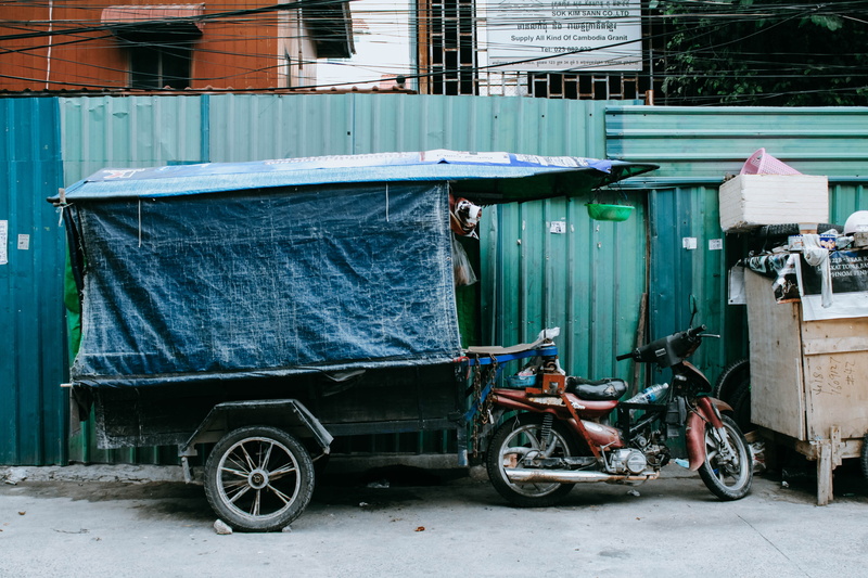 no people, scooter, mode of transportation, day, street, motorcycle, motor, transportation, corrugated iron, tuk tuk, red, food, building exterior, built structure