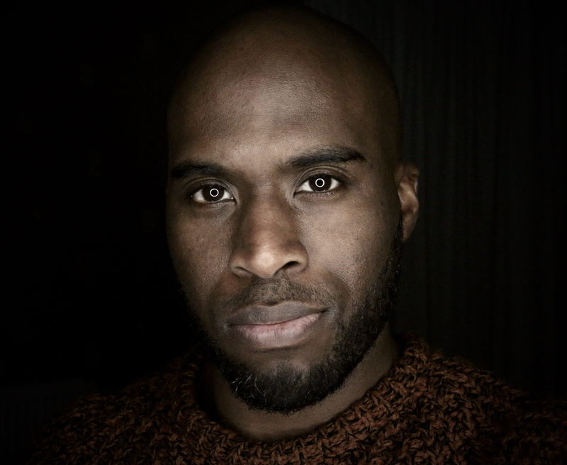 adult, shaved Head, young Men, beard, closeup, confidence, ebony, african Descent, studio Shot, dark background, indoors, smiling, facial Expression, face