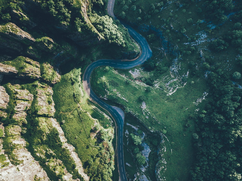transportation, tranquil scene, scenics - nature, green, curve, environment, plant, hill, water, no people, photography, non-urban scene, cliff, beauty in nature