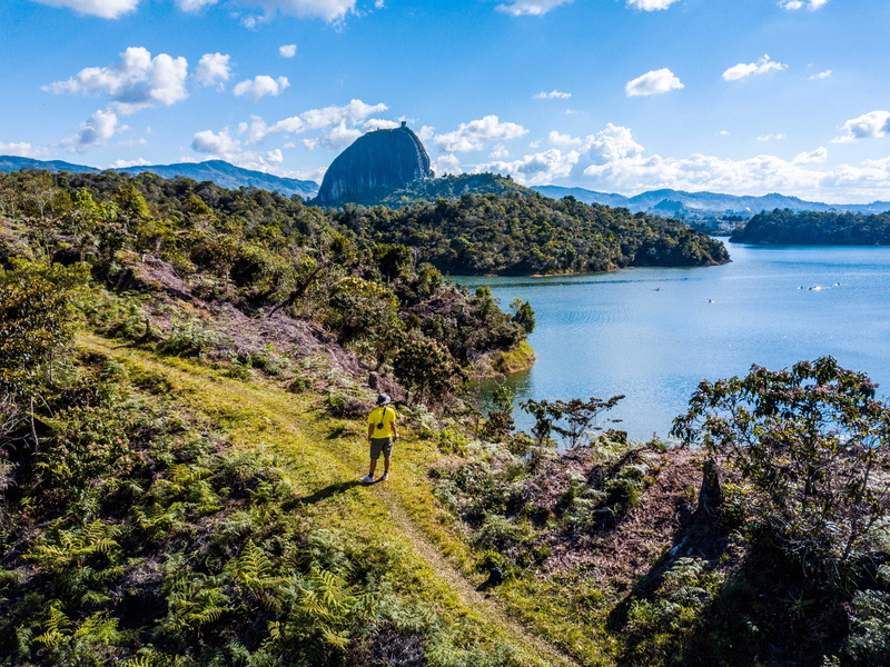 landscape, plant, tranquil scene, man, cloud - sky, tranquility, birds eye view, non-urban scene, grass, bay, mountain, sky, drone shot, dji, near, aerial shot
