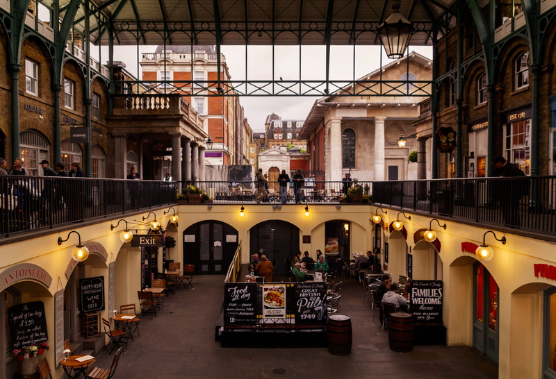 women, incidental people, arch, transportation, architecture, covent garden, restaurant, building exterior, city, real people, outdoors, lights, men, crowd
