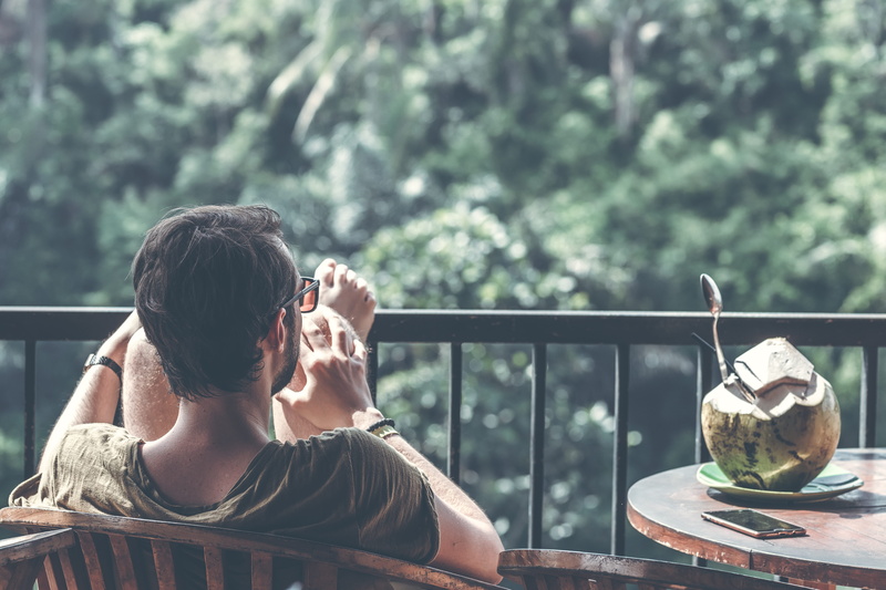 man, holding, recreation, tree, beverage, rear view, focus on foreground, lifestyles, outdoors, nature, sit, women, drink, fresh, leisure, one person, coconut