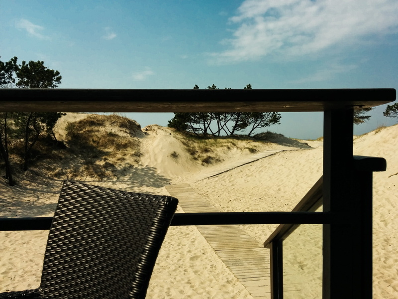 chair, cloud - sky, rest house, lounge, walkway, built structure, vacation, black, tranquility, summer, patio, water, sand, deck, no people, holiday, scenic