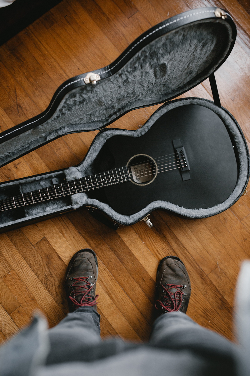wood - material, jeans, guitar, high angle view, topdown, from where i stand, human body part, low section, floor, human limb, leg, standing, picture, lifestyles