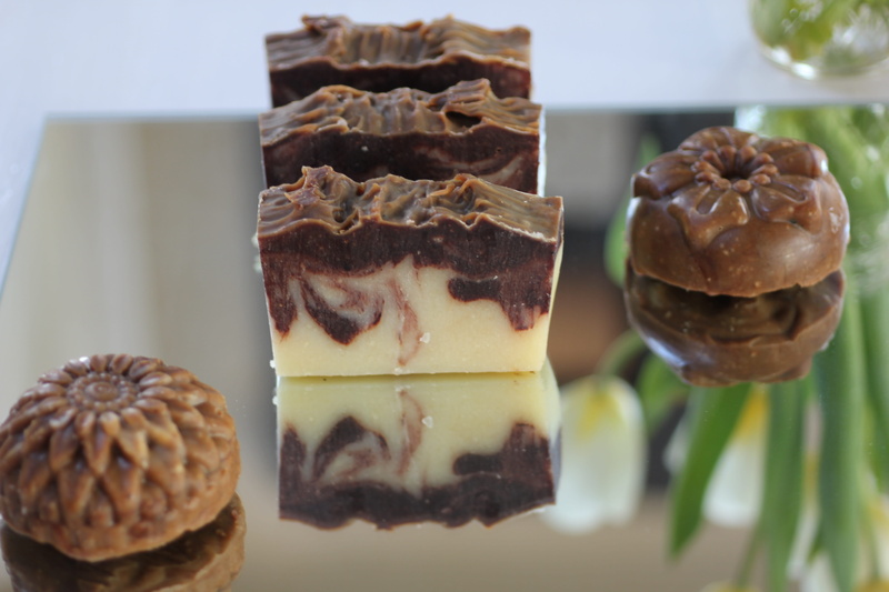 focus on foreground, baked pastry item, cocoasoap, hygiene, freshness, close-up, body, dessert, massage, spa, tray, snack, aroma, brown, homemade, relaxing soap