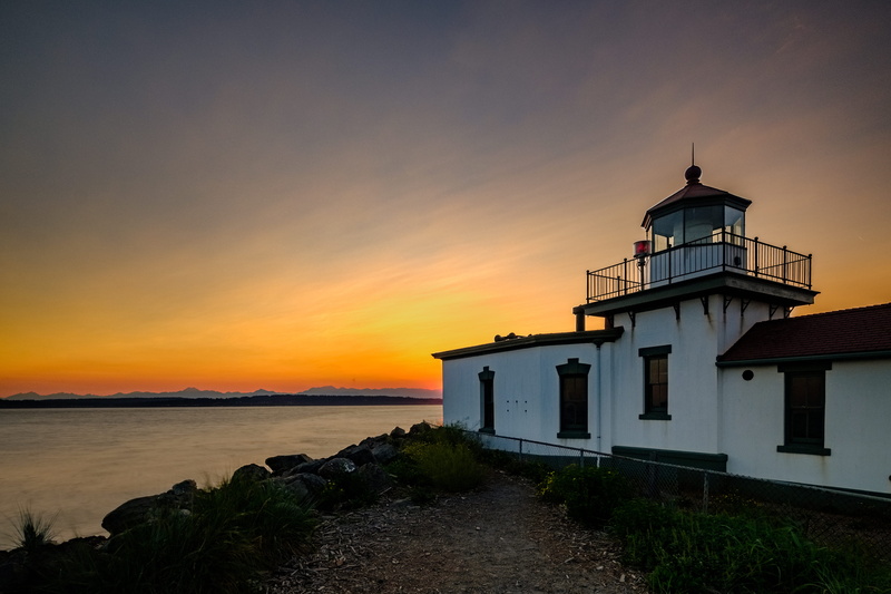 house, sky, beach, orange color, villa, seattle, built structure, sea, west point lighthouse, no people, housing, concrete, horizon over water, horizon