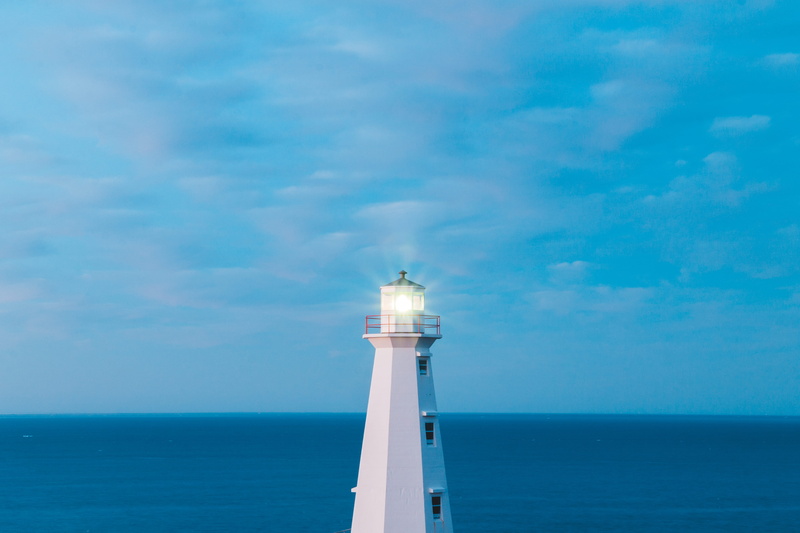 tower, clothing, control tower, cottage, water, scenics - nature, beacon, white, lighthouse, no people, sea, horizon, handrail, azure sky, direction, cloud - sky