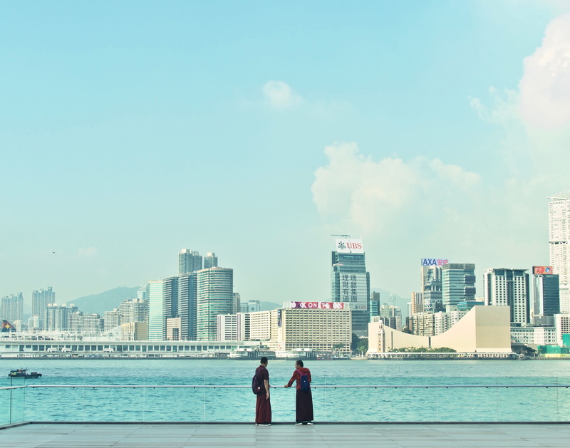 harbour, outdoors, sky, building, two people, cityscape, built structure, togetherness, cloud - sky, water, city, hong kong, coast, wan chai, real people