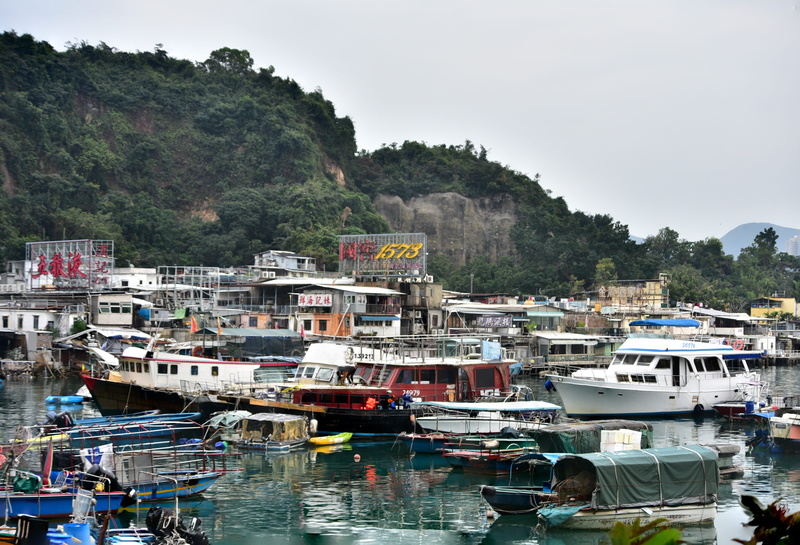 building exterior, mountain, boats, city, nature, vehicle, view, travel, dock, building, quarry bay, mode of transportation, architecture, ship, urban