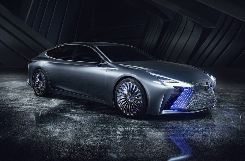silver colored, black color, no people, shiny, wheel, sports car, personal land vehicle, car, vintage car, motor vehicle, reflection, mode of transportation