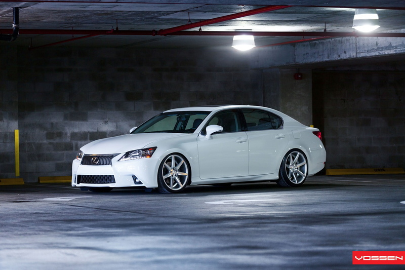 parking lot, built structure, white color, street, speed, parking garage, sign, car, architecture, no people, Lexus, motion, mode of transportation, motor vehicle