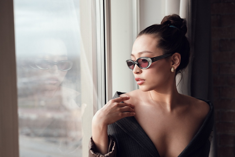 women, women with shades, clothing, cleavage, model, beauty, glasses, standing, one person, women indoors, hairbun, contemplation, bare shoulders, indoors
