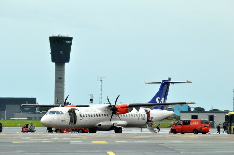 sas, beside, arrival, aeroplane, aviation, red, airline, sky, outdoors, copenhagen, vacation, flying, transportation, plane, transport, clear sky, aerospace industry