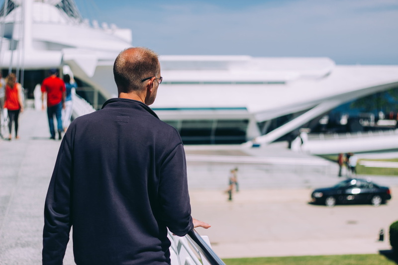 airplane, standing, walking, lifestyles, leaving, day, guy, transportation, arrival, outdoor, travel, architecture, airport terminal, air vehicle, focus on foreground
