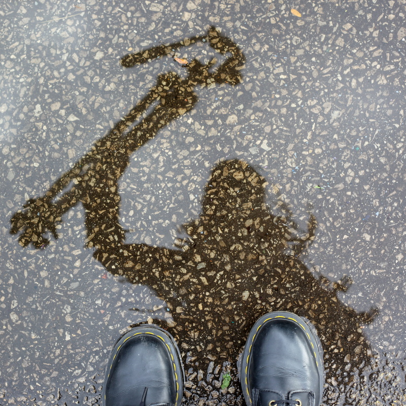 wet, managed, shadow, limb, rain, breakfast club, water, directly above, city, personal perspective, human leg, human foot, day, men, body part, low section