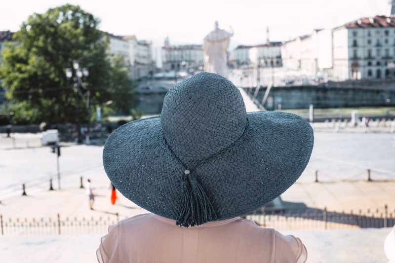 focus on foreground, church, unrecognizable person, dress, architecture, one person, warm clothing, summer, religion, built structure, lifestyles, city