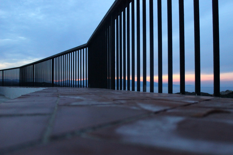 fence, building exterior, selective focus, metal, pattern, day, capdecreus, built structure, puestadesol, light, spain, colors, blue, no people, landscape