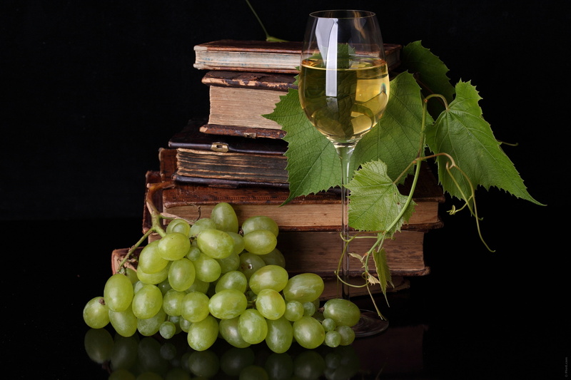 table, container, wine, stack, grape, green color, food, no people, 2K, indoors, glass, plant part, food and drink, green, books, wellbeing, Liana, still life