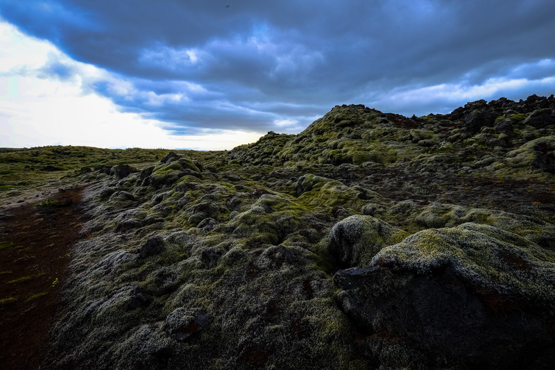 rocks, tranquility, terrain, moss, cloud - sky, non-urban scene, land, rocky, daylight, tranquil scene, mossy, scenic, day, rock, solid, no people, formation