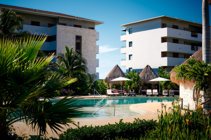 word, plant, outdoors, building, architecture, sun, garden, swimming, morning, resort, tourist resort, palm tree, tropical climate, vacation, swimming pool