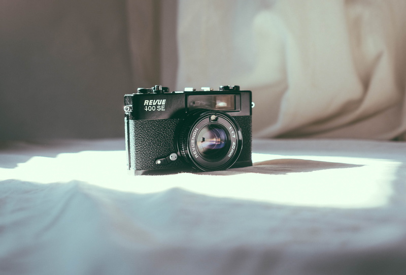 photographic equipment, point, photographer, digital camera, close-up, 40mm, black, shoot, fujixpro2, indoors, antique, selective focus, day, lens - optical instrument