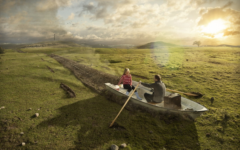 two people, sunlight, couple, non-urban scene, creativity, women, rock, white, day, men, clouds, lifestyles, adult, paddleship, ground, field, hills, outdoors