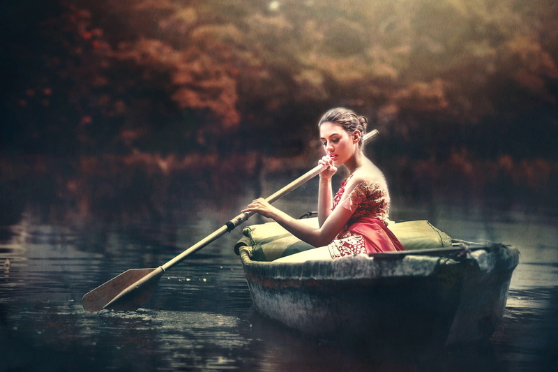 adult, paddling, nautical vessel, boat, leisure activity, sitting, day, mode of transportation, transportation, women, water, outdoors, rowing, lake, rowboat