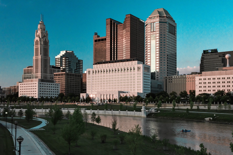 architecture, financial district, office building exterior, urban, built structure, transportation, building, tower, reflection, water, downtown, buildings