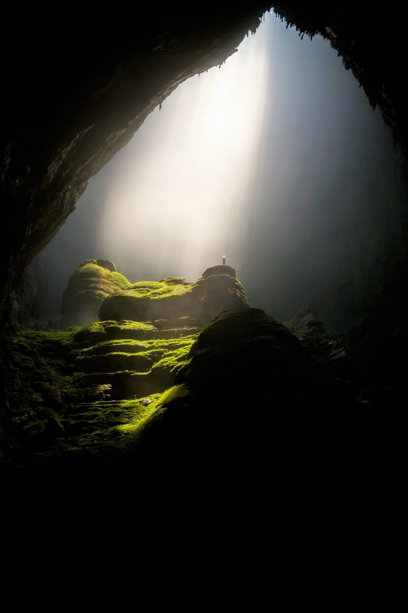 no people, daylight, solid, scenics, day, cave, tranquil scene, rock - object, fog, travel, sunlight, mountain, rock, stone cave, sky, grass, environment