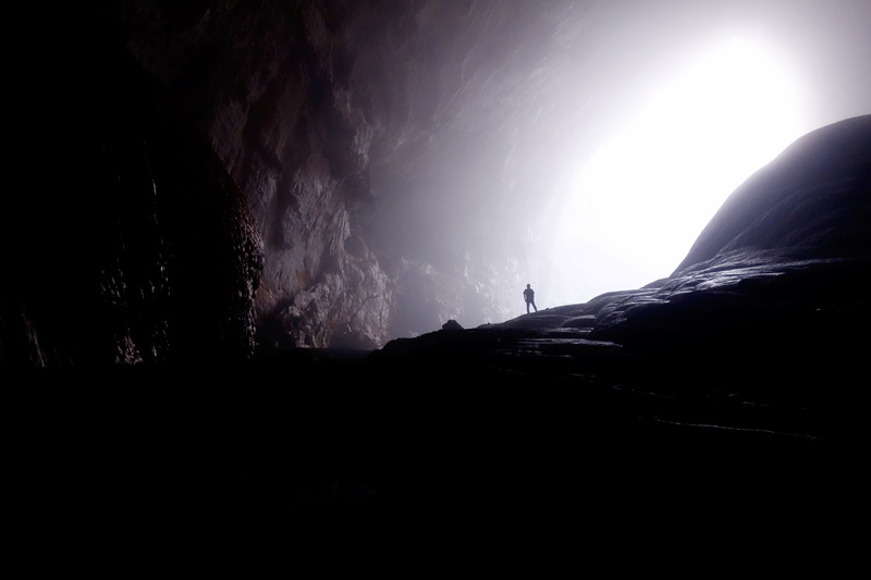 cold temperature, hill, no people, nature, horizon, silhouette, mountain, dark, back lit, cavern, light - natural phenomenon, outdoors, landscape, beauty in nature