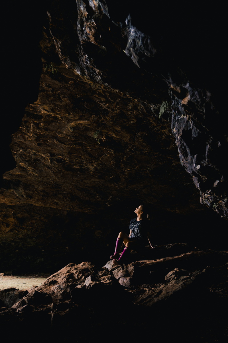 hidden soul, real people, one person, outdoors, solid, rocky, side view, female, rocky walls, hide, woman, rock - object, adventure, girl, dark, darkness