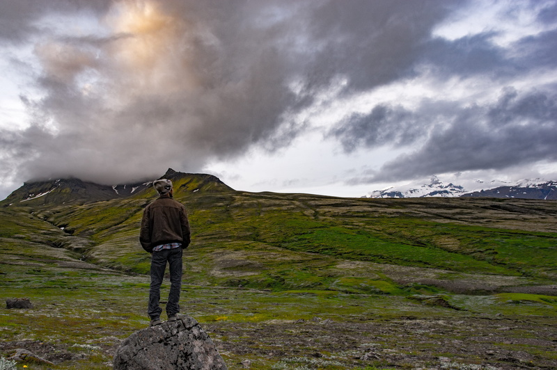 beauty in nature, hiking, clouds, one person, landscape, outdoors, skaftafell, nature, full length, adventure, scenics - nature, non-urban scene, lifestyles