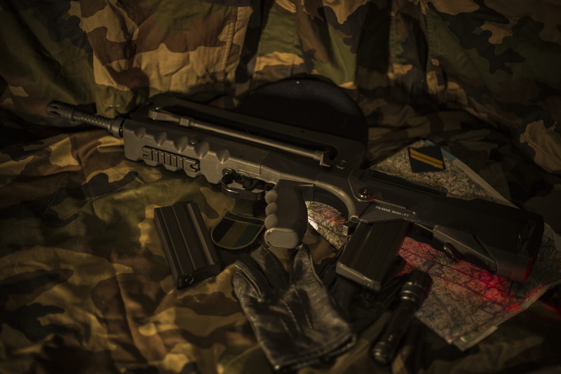 government, gun, high angle view, no people, aggression, surface, sign, camouflage, textile, lying, famas, bed, military, dark, armed forces, woodland